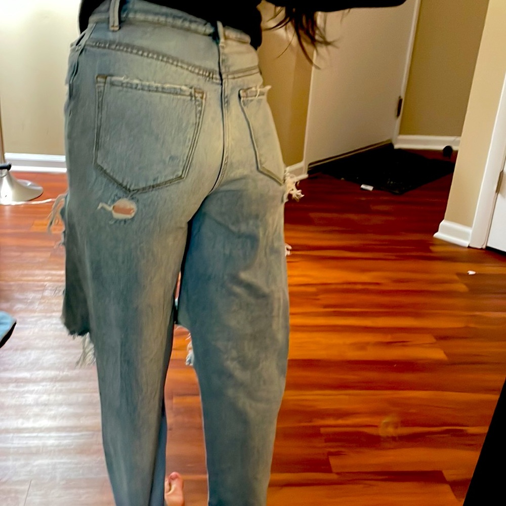 High waisted light wash jeans that we ripped/designed by me after purchase